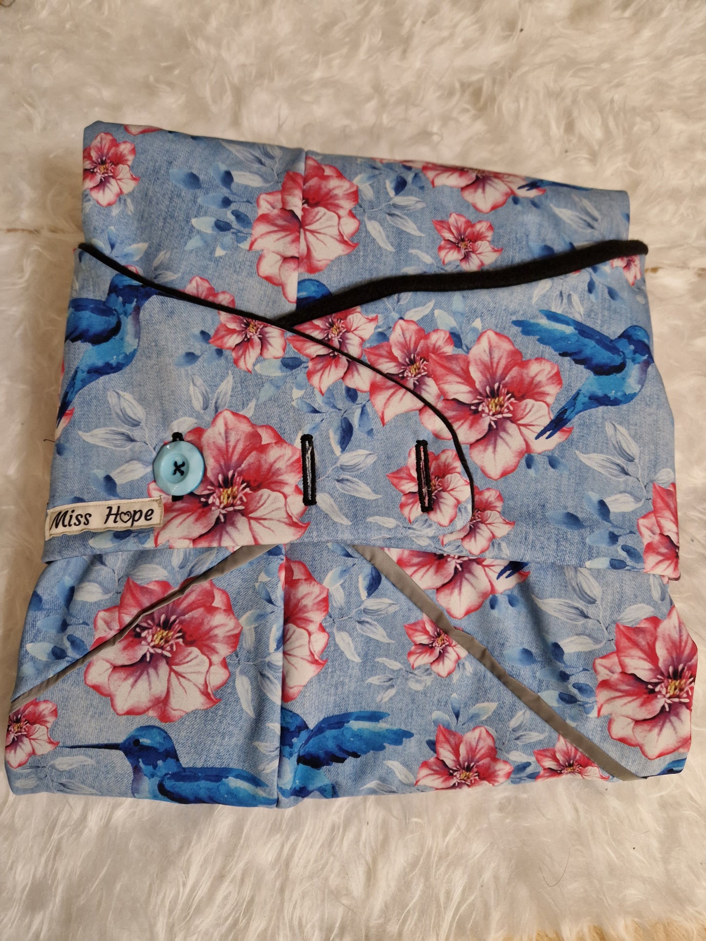 Kolibir mit leichten Reflektionsstreifen in Größe M/L