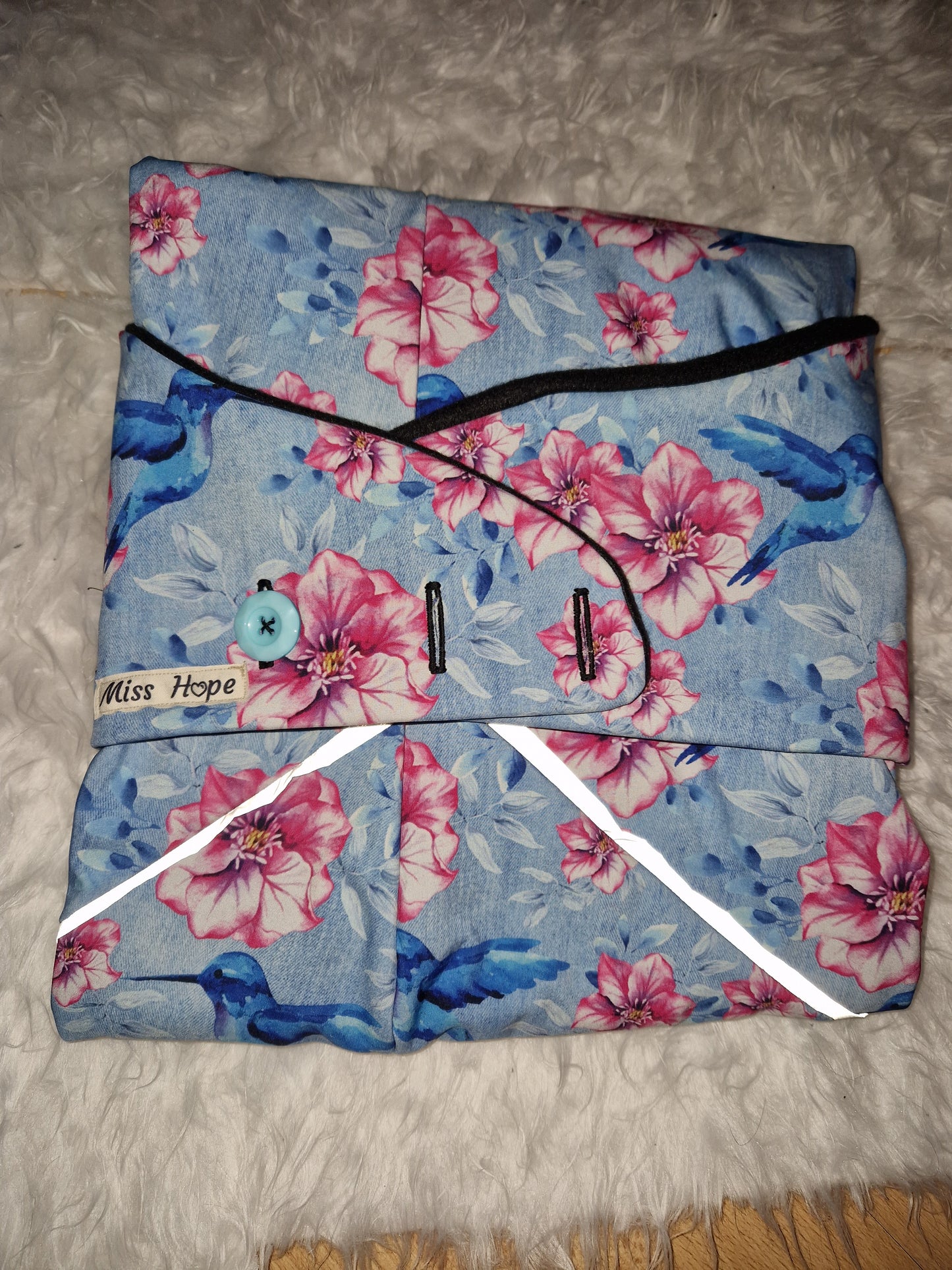 Kolibir mit leichten Reflektionsstreifen in Größe M/L